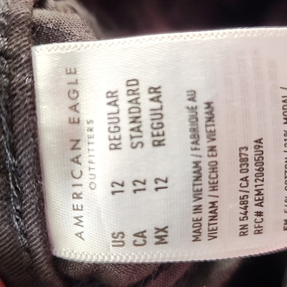Black American eagle size 12, 14, 16 reg as well as 12 long and 14 long pants - Picture 6 of 6